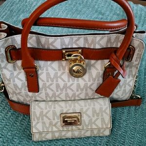 Authentic Michael Kors monogrammed handbag and wal